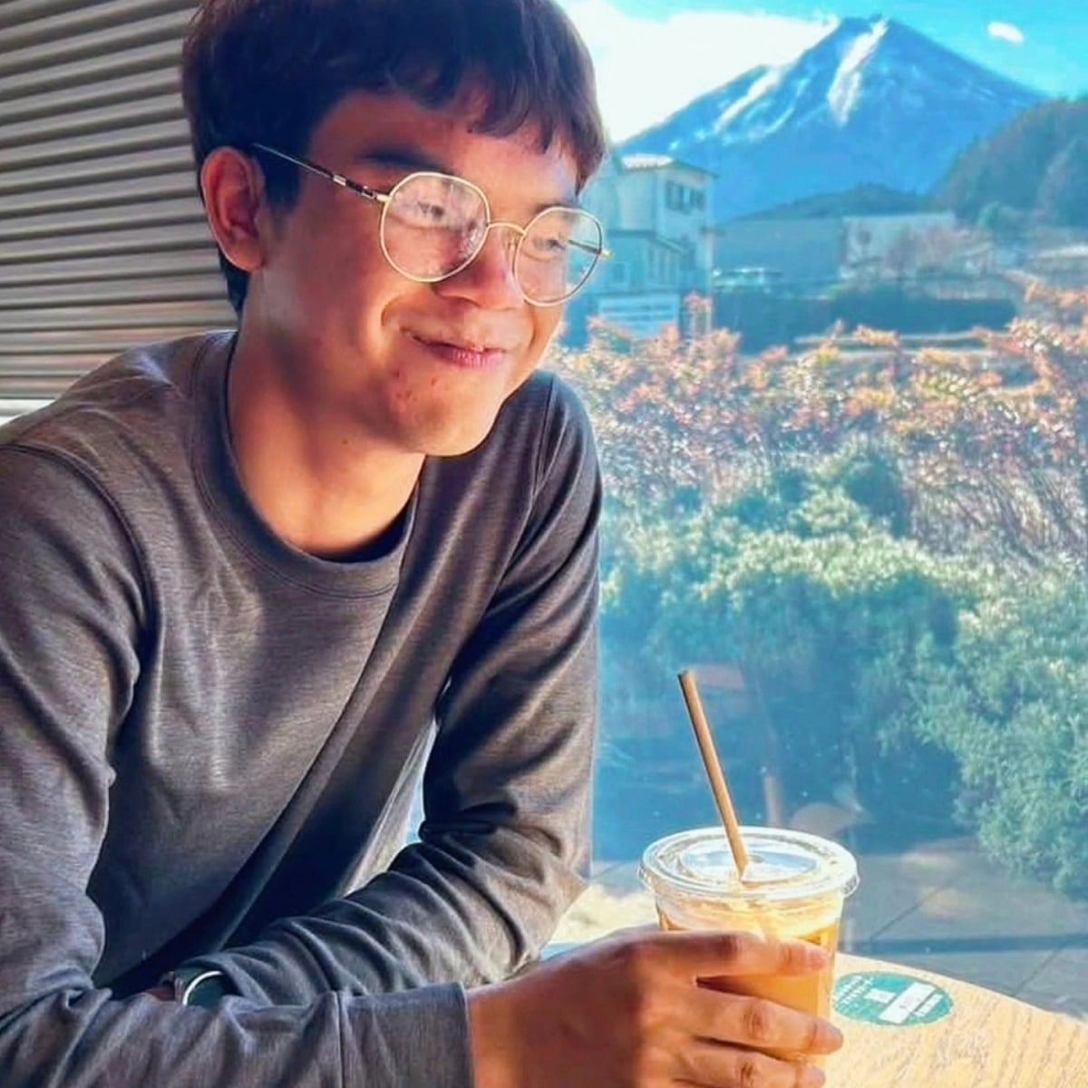Palm at a cafe in Kawaguchiko, Japan, with Mt. Fuji in the background.