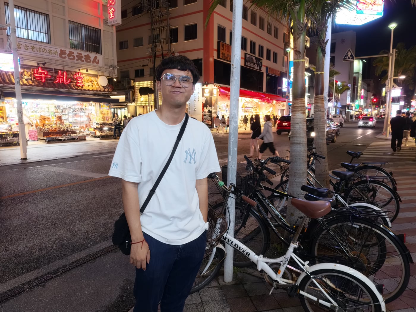 Palm on a Naha shopping street at night.